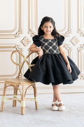 Black and gold dress